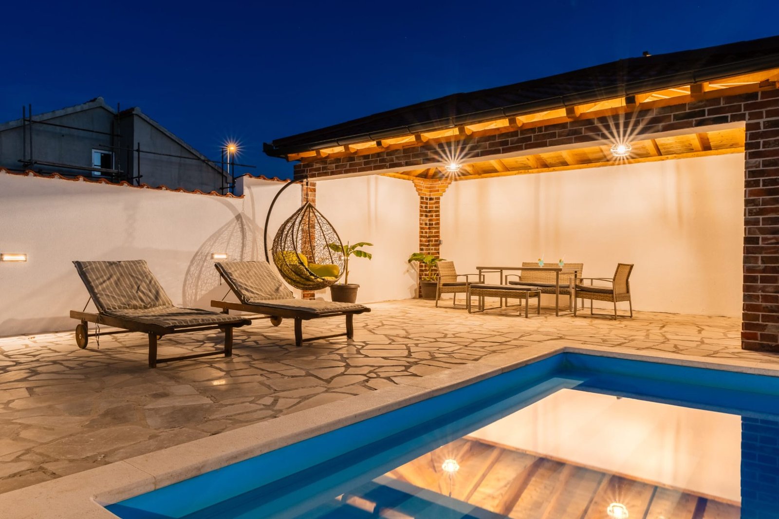 Pool terrace at night — Holiday House Meri